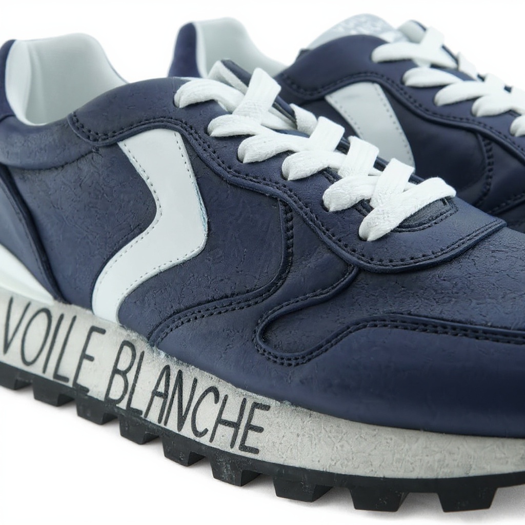 Detalle técnico de los materiales náutico, piel y napa de las deportivas VOILE BLANCHE azules.